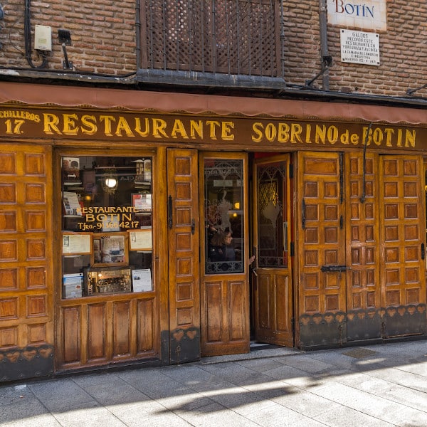 Wooden facade of Restaurante Sobrino de Botín on Calle de Cuchilleros