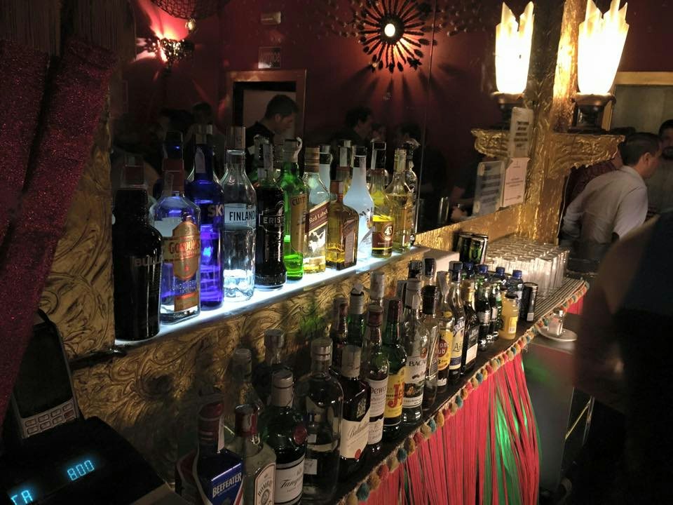 Bar interior at El Cangrejo, red lighting