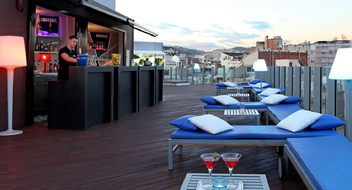 Sky Bar rooftop at Axel Hotel, dusk