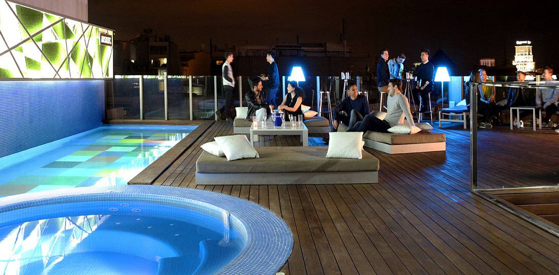 Rooftop pool at Axel Hotel Barcelona at night