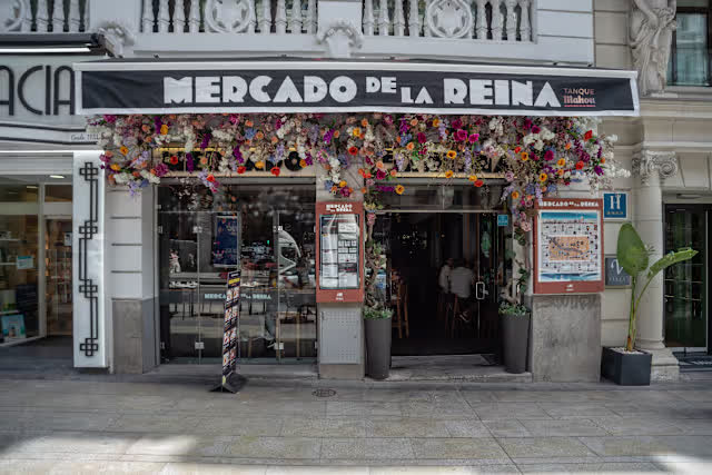 Flower-decked entrance of Mercado de la Reina 12