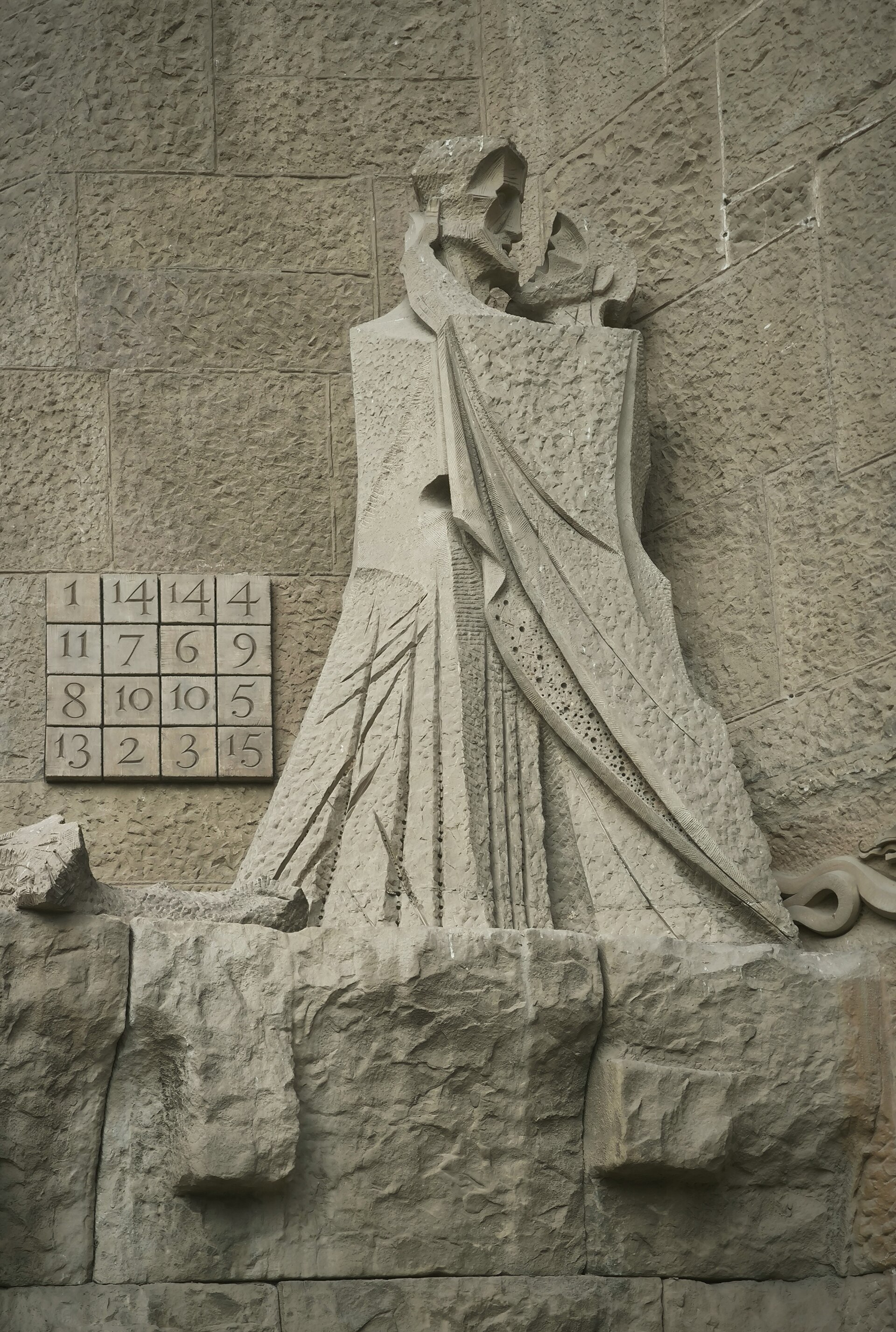 The Kiss of Judas sculpture and magic square on the Passion facade