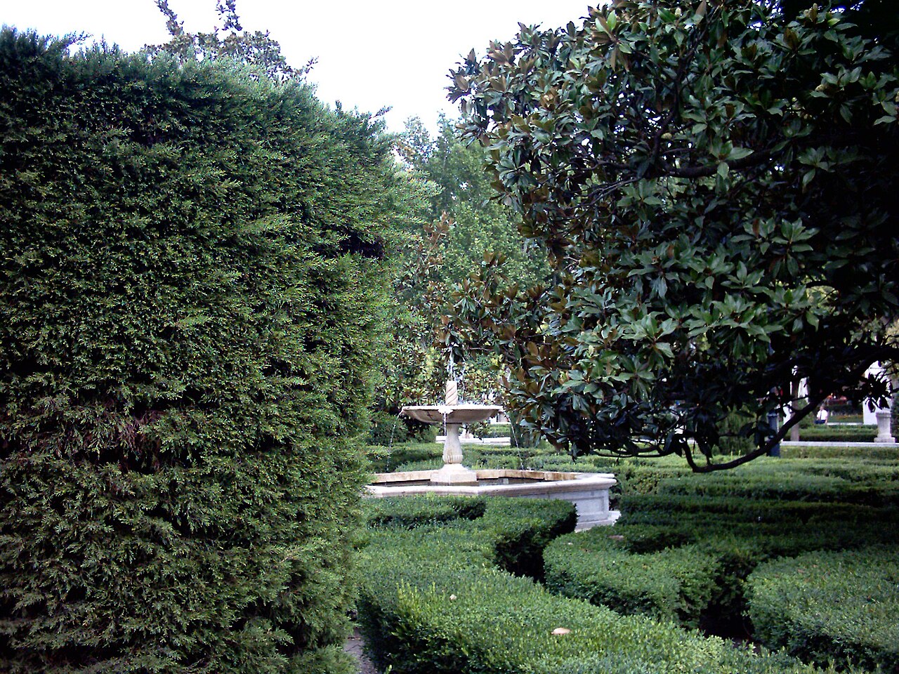 Plaza de Oriente gardens and statues facing the Royal Palace