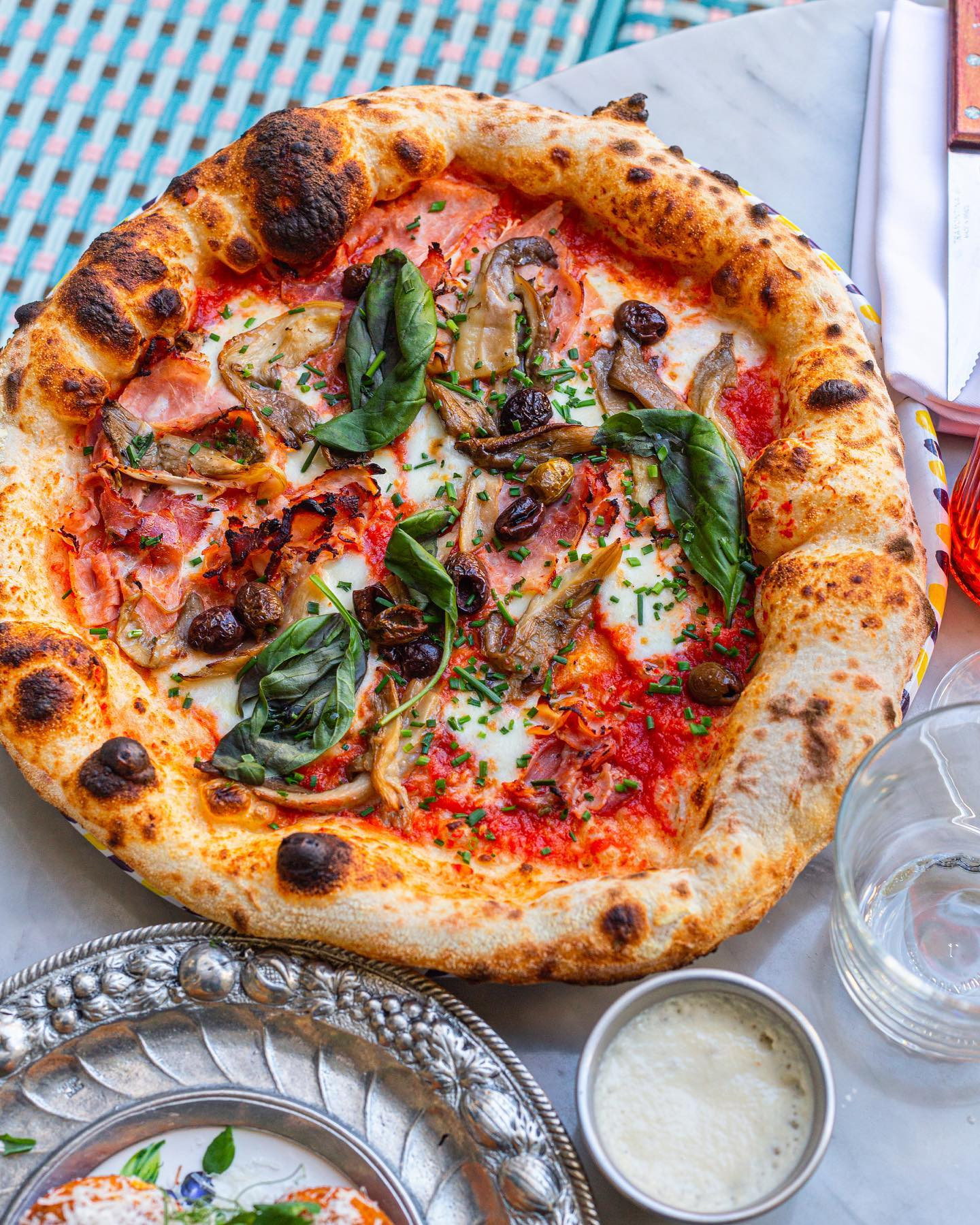Neapolitan pizza with mushrooms and basil at Villa Capri