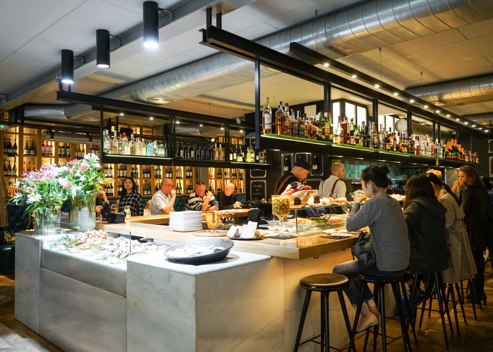 Crowded tapas bar at Vinitus Barcelona